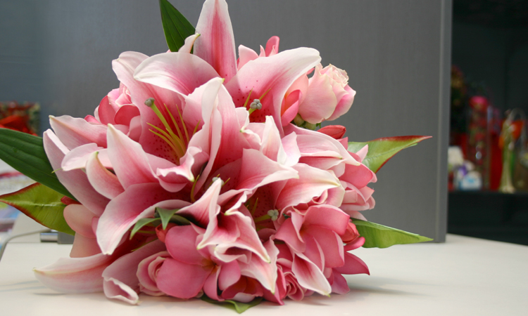 pink lily and frangipani bouquet