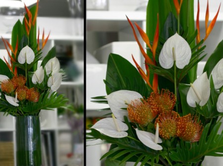 white and orange floral reception arrangement