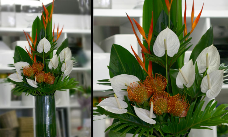 white and orange floral reception arrangement