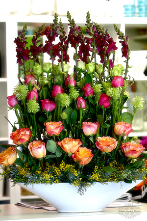 large tiered arrangement with roses