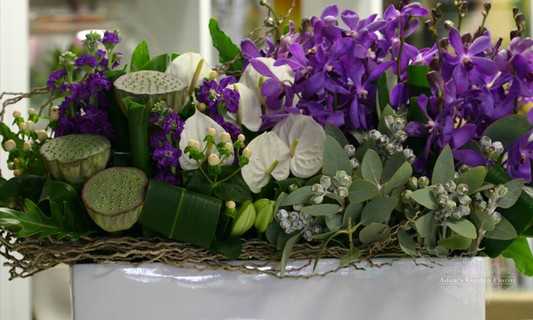 purple white green flower arrangement delivered gold coast