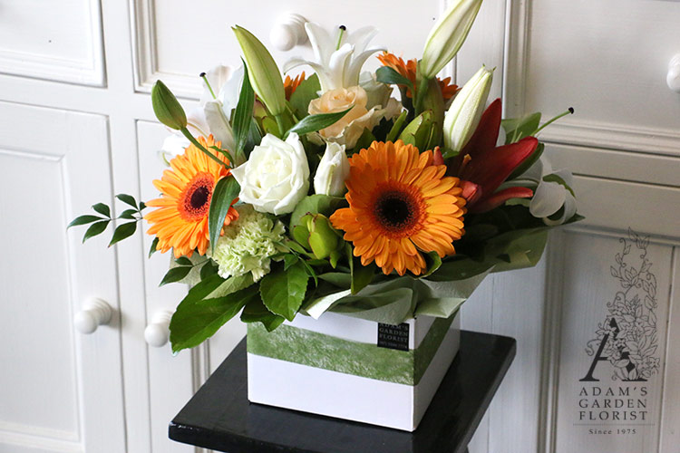 floral box arrangement white orange green gold coast florist