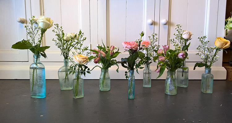 florist cottage flowers in vintage bottles gold coast