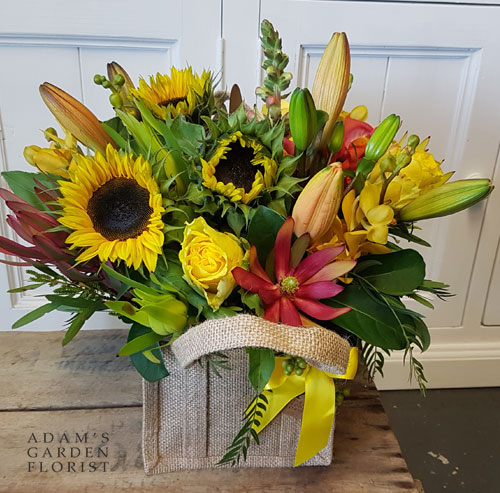 Jute bag florals. Yellow, orange, red. From Gold Coast Flower Shop Parkwood.